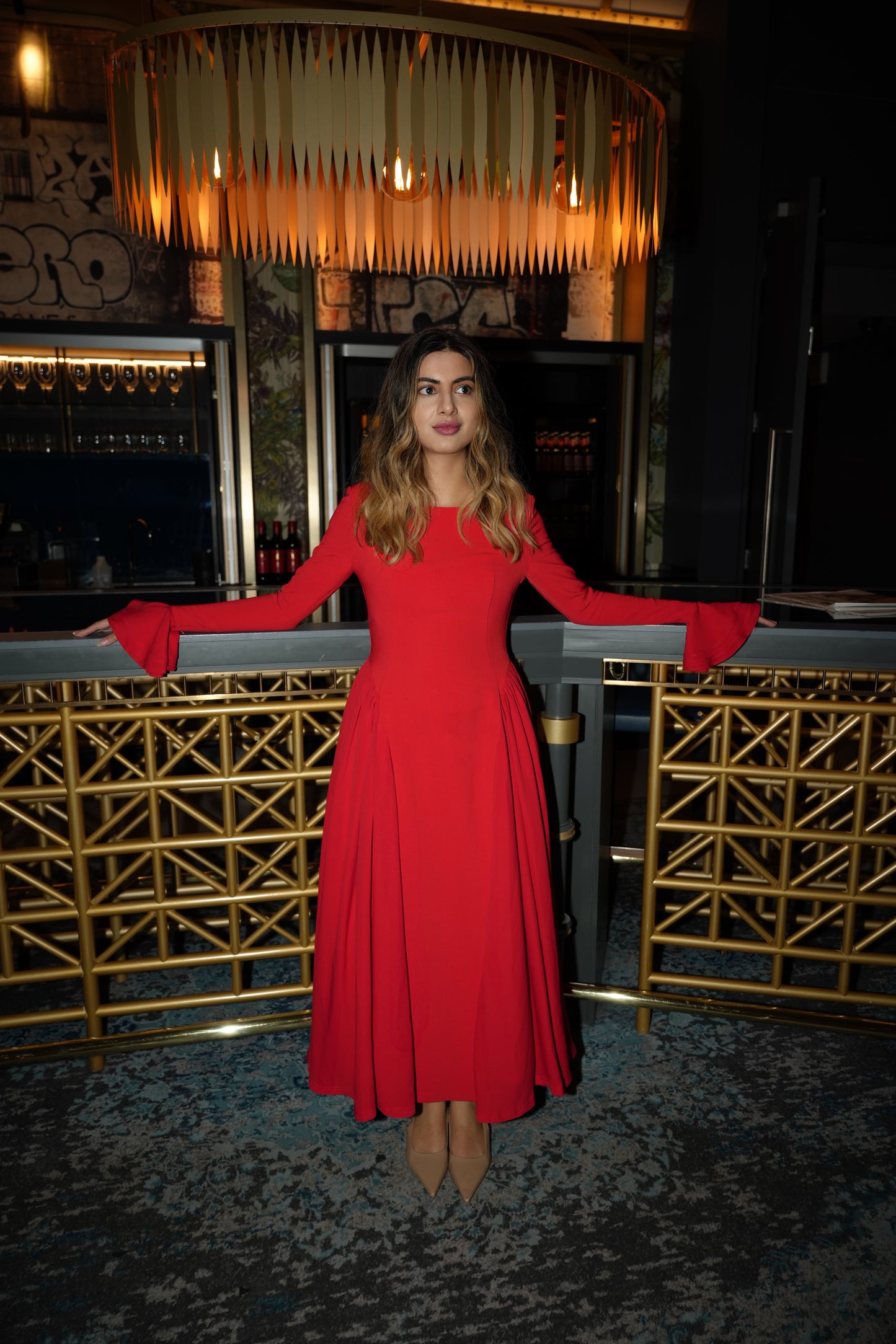 Lady in Red Pleated Dress